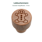 Originalgravur Lebkuchenmann auf dem Holzgriff eines 19-mm-Holzgriffkorkens.
