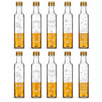 250 ml Maraska mit Weihnachtsgravur – 10er-Mix – 10 Gefäße mit den enthaltenen Verschlüssen und den angegebenen Glasgravuren, weißes Produktbild